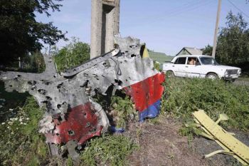 Torn from MH-17 Cockpit at cruising altitude. Note evidence of high-callibre bullet holes.
